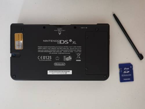 Nintendo DSi XL (Blue) and DS Game