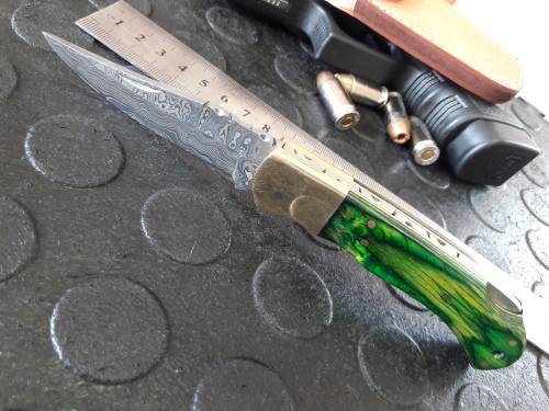 Handmade DAMASCUS  Folding Knife. Please study pictures for detail. Crazy R1 start, No reserve.
