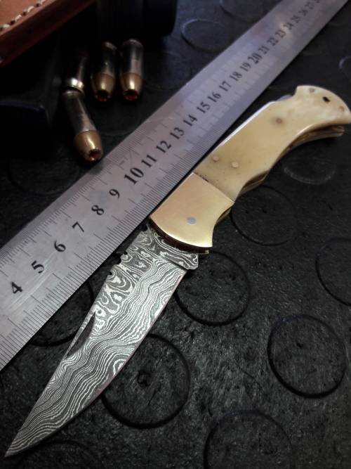 Handmade DAMASCUS  Folding Knife. Please study pictures for detail. Crazy R1 start, No reserve.