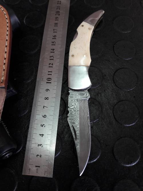 Handmade DAMASCUS  Folding Knife. Please study pictures for detail. Crazy R1 start, No reserve.