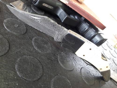 Handmade DAMASCUS  Folding Knife. Please study pictures for detail. Crazy R1 start, No reserve.