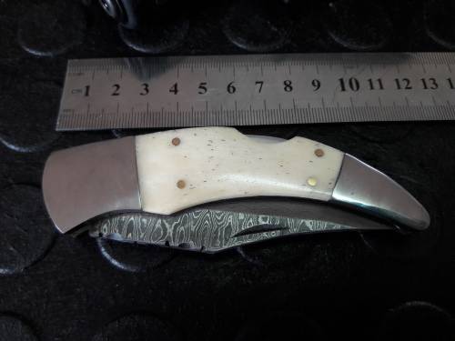 Handmade DAMASCUS  Folding Knife. Please study pictures for detail. Crazy R1 start, No reserve.