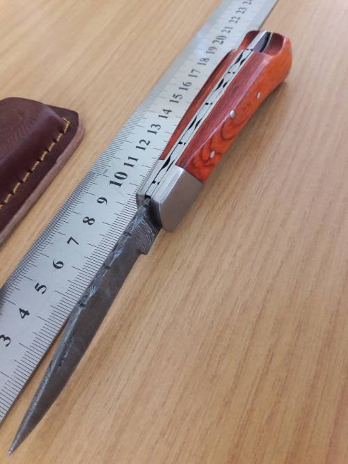 Handmade Damascus steel folding knife with WOODEN handle scales.