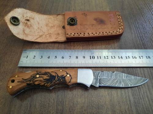 Handmade Damascus steel folding knife w Wooden Handle Scales. New stock !! LEATHER Pouch is BAD.