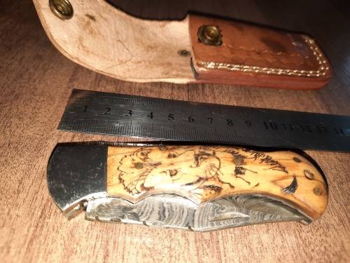 Handmade Damascus steel folding knife w Wooden Handle Scales. New stock !! LEATHER Pouch is BAD.