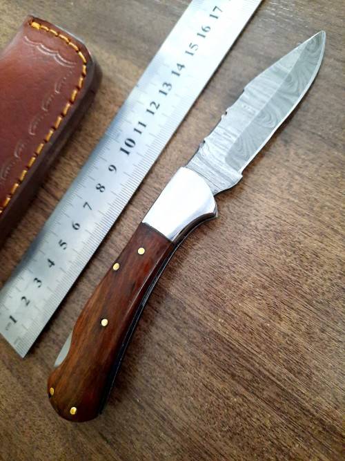 Handmade Damascus steel folding knife w Wooden Handle Scales. New stock !!