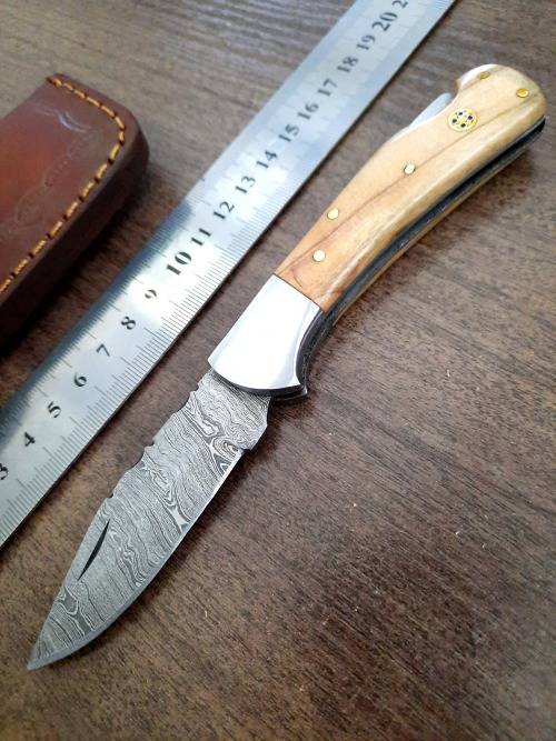 Handmade Damascus steel folding knife w Olive Wood Handle Scales. New stock !!