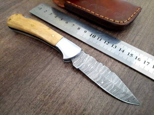 Handmade Damascus steel folding knife w Olive Wood Handle Scales. New stock !!