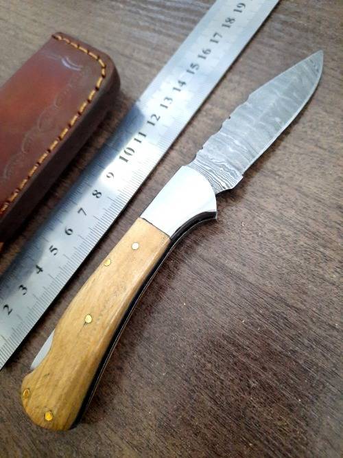 Handmade Damascus steel folding knife w Olive Wood Handle Scales. New stock !!