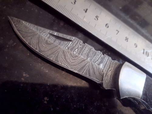 Handmade Damascus steel folding knife w Wooden Handle Scales. Pouch in bad shape, see pictures.
