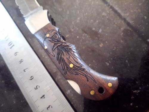 Handmade Damascus steel folding knife w Wooden Handle Scales. Pouch in bad shape, see pictures.