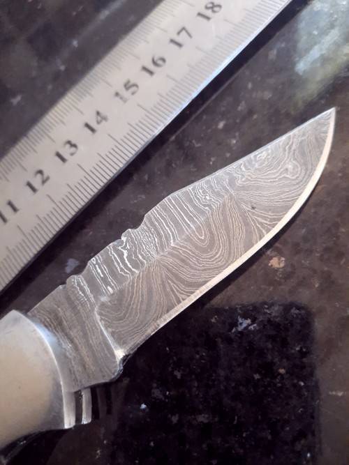 Handmade Damascus steel folding knife w Wooden Handle Scales. Pouch in bad shape, see pictures.