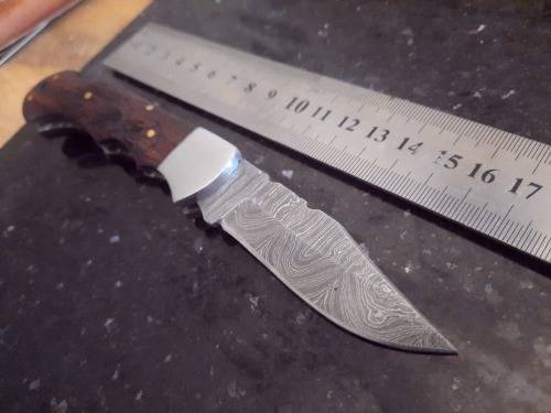 Handmade Damascus steel folding knife w Wooden Handle Scales. Pouch in bad shape, see pictures.