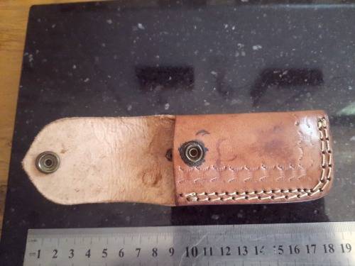 Handmade Damascus steel folding knife w Wooden Handle Scales. Pouch in bad shape, see pictures.