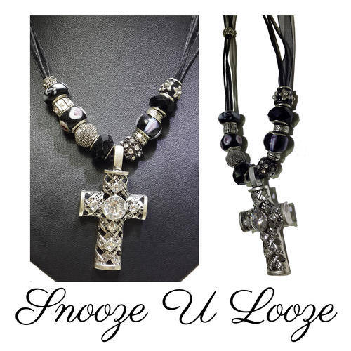 An elegant  handmade necklace with Pandora beads, and an exquisite Jewelled Cross  pendant.