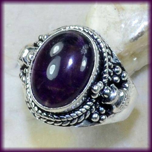 AMETHYST 10 X 14 MM RING SIZE 7.5 SET IN 925 STERLING SILVER RING