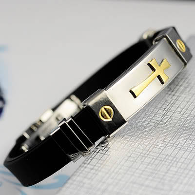 MANS STAINLESS STEEL 316L SILVER AND GOLD CROSS ON AN  ION RUBBER BRACELET