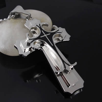 SILVER AND BLACK STAINLESS STEELCROSS  WITH FREE THONG OR  BLACK S.STEEL  BALL CHAIN