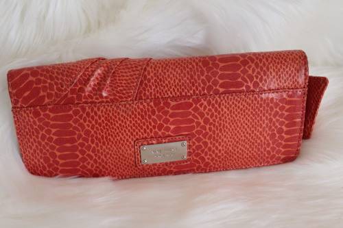 Orange Nine West Clutch with Faux Snakeskin and Bow Detail (Measures 12 x 26 cm)