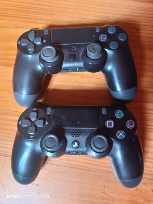 Sony Playstation 4 controllers x 2 (Sold as is)