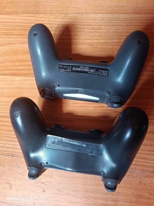 Sony Playstation 4 controllers x 2 (Sold as is)