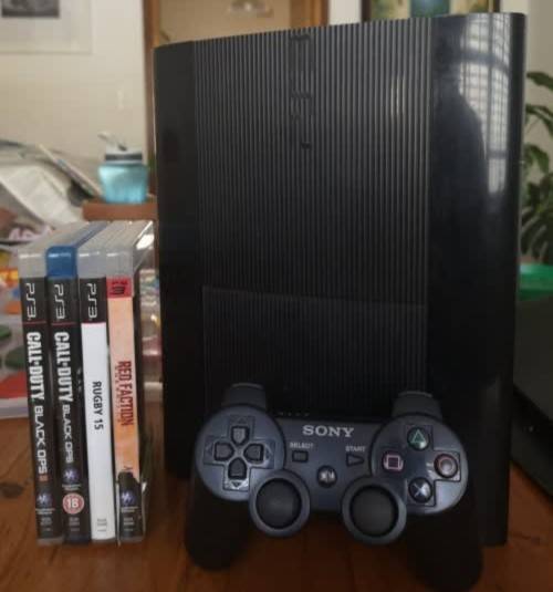 PLAYSTATION 3 CONSOLE + 4 GAMES!!