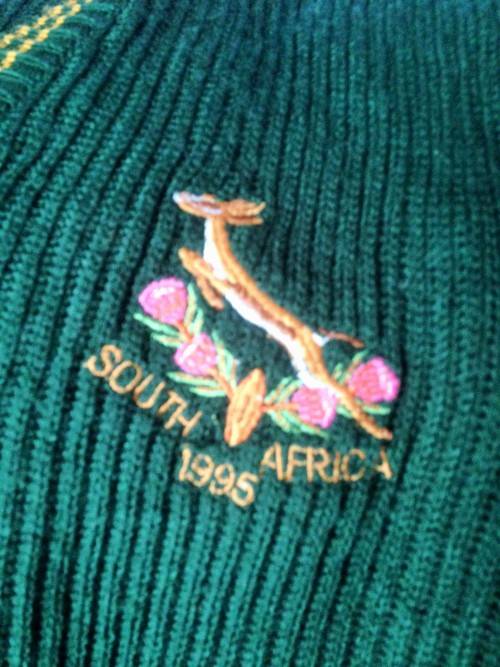 SLEEVELESS SWEATERhasEMBLEMofSOUTH AFRICA 1995 WORLD CUP RUGBY+2BOOKs*L@KatMyBUY NOWitems*NO WAIT