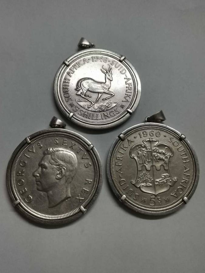 3 Silver 5 shilling coins in pendant settings