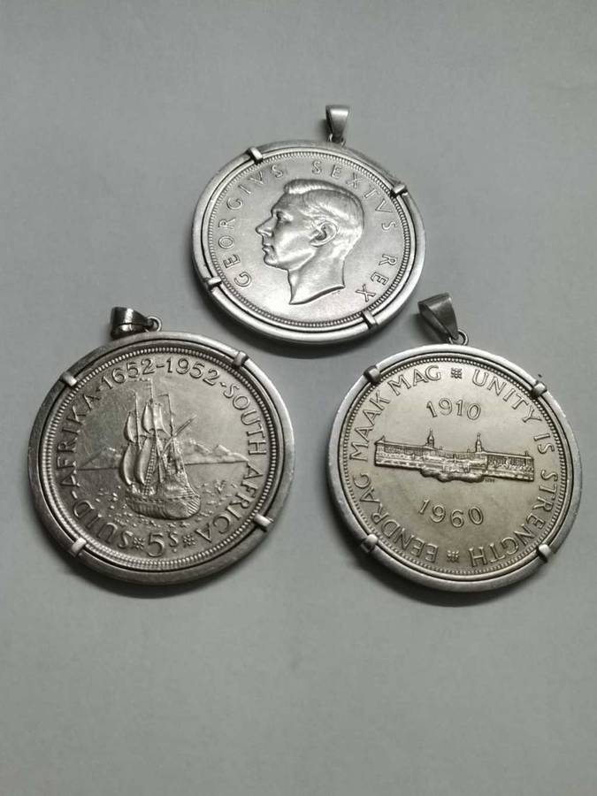 3 Silver 5 shilling coins in pendant settings