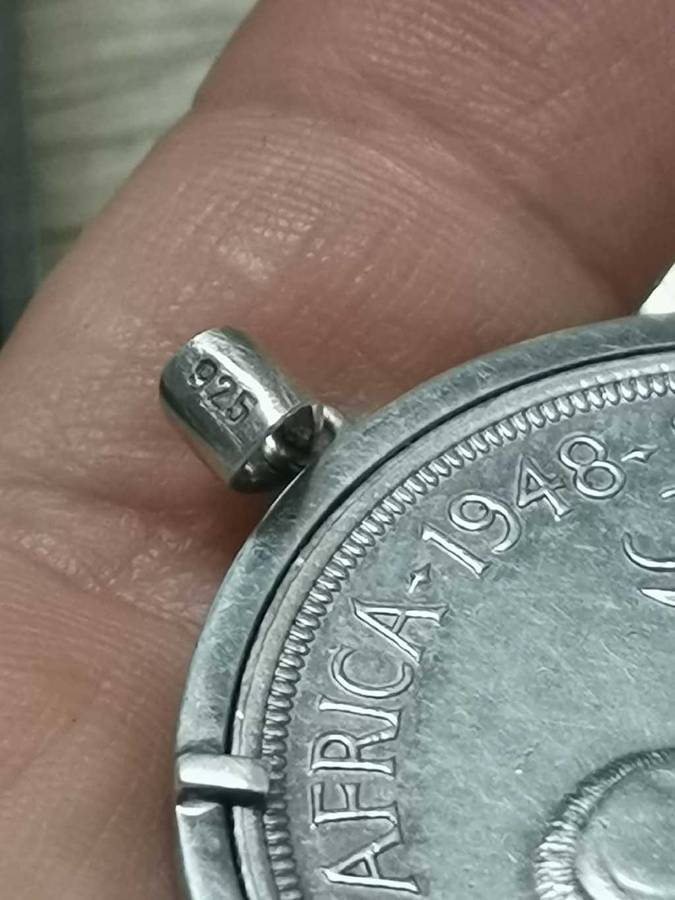 3 Silver 5 shilling coins in pendant settings