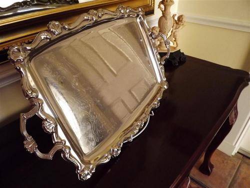 SILVER PLATED TEA TRAY WITH HANDLES AND EMBOSSED DESIGN
