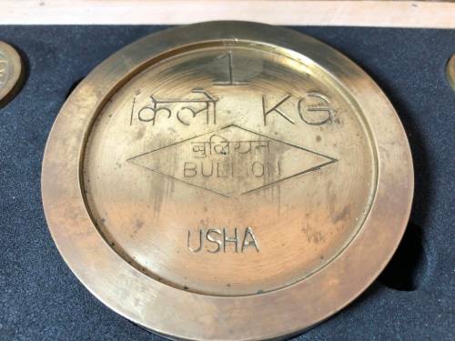 Vintage brass bullion weights in wooden box