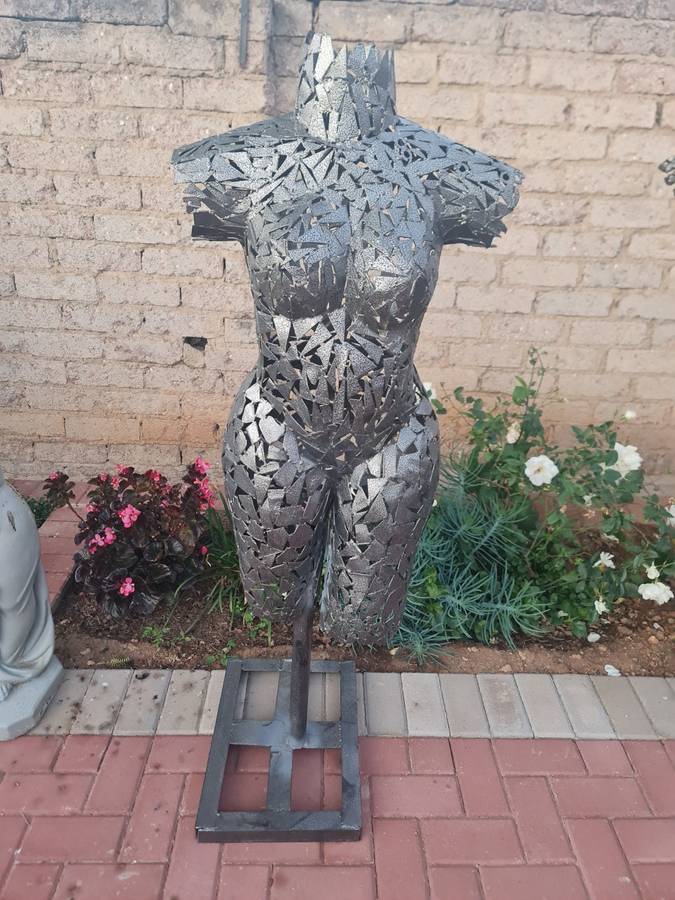 Hand Crafted Metal Female Torso Sculpture With a Metal Base
