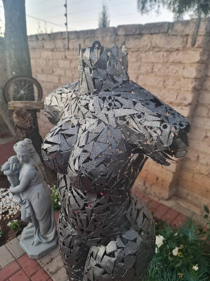 Hand Crafted Metal Female Torso Sculpture With a Metal Base
