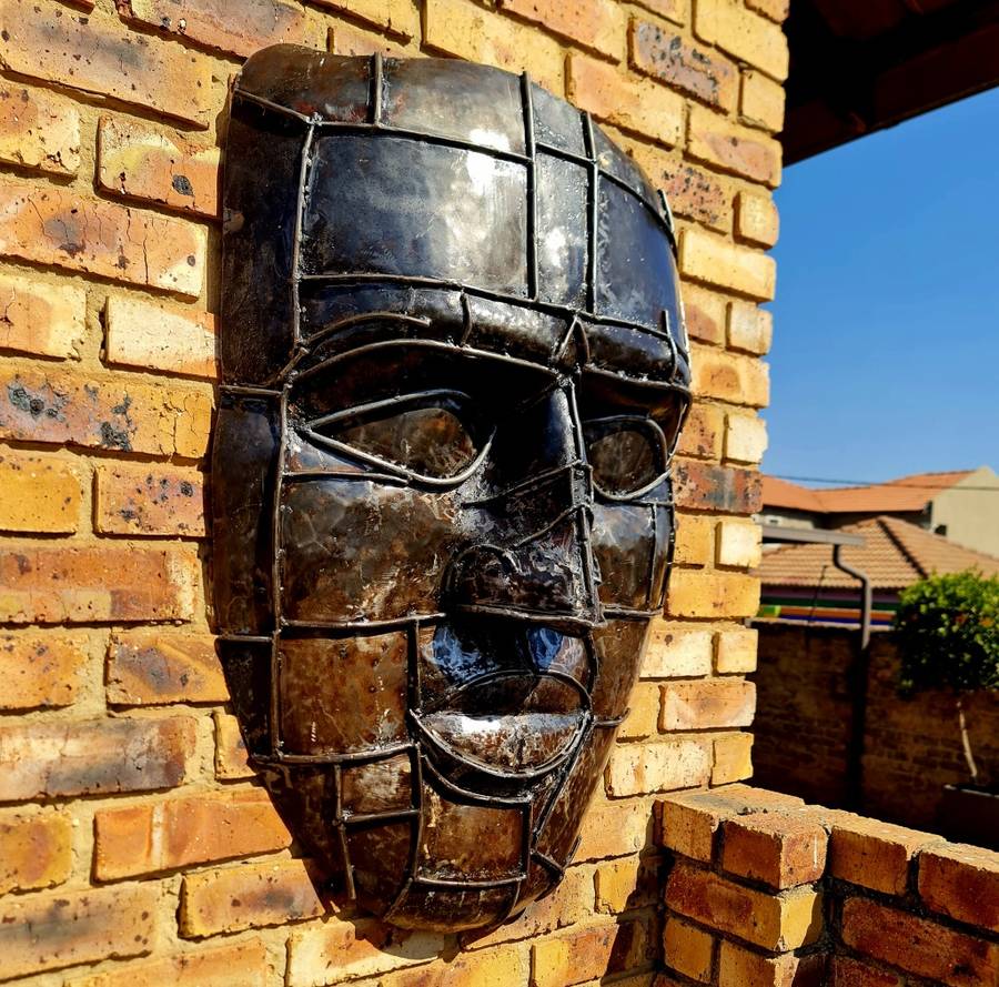Large Heavy Solid Metal Face Sculpture