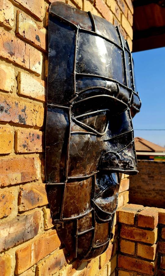 Large Heavy Solid Metal Face Sculpture
