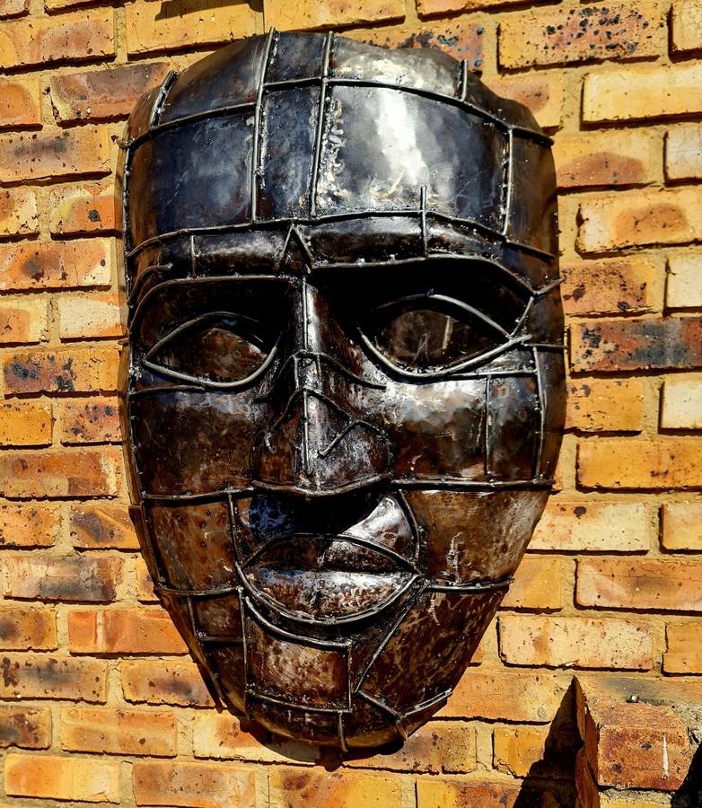 Large Heavy Solid Metal Face Sculpture
