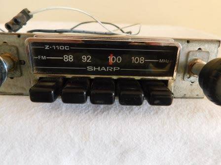 SHARP CAR RADIO WITH 2 PANASONIC SPEAKERS INCLUDED