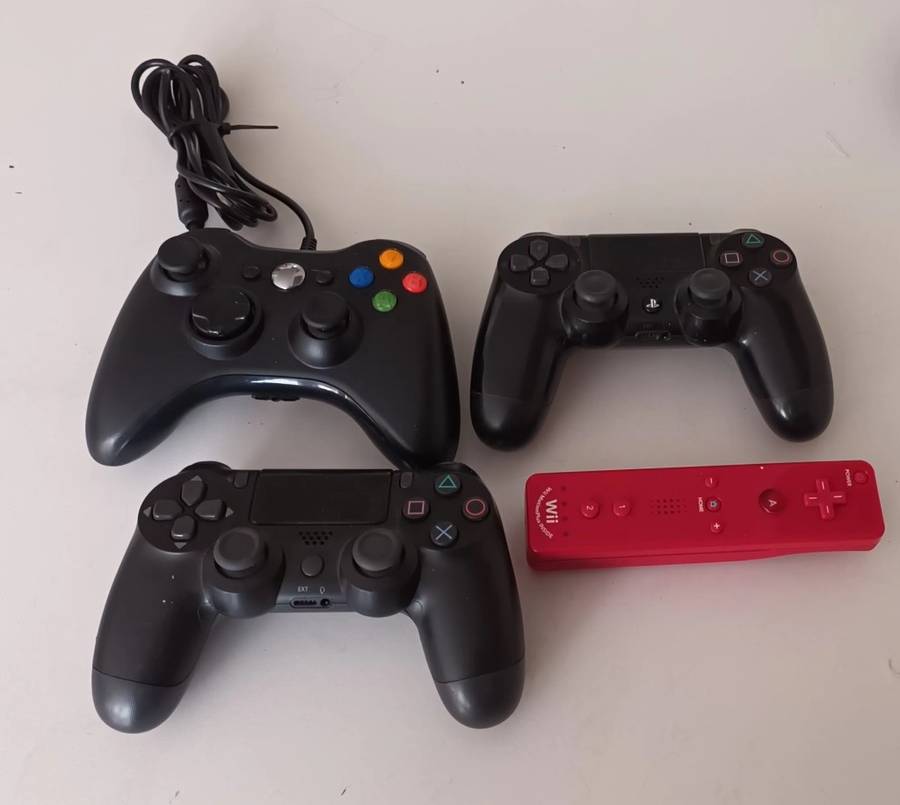 PlayStation & Wii remotes for spares or fixing.