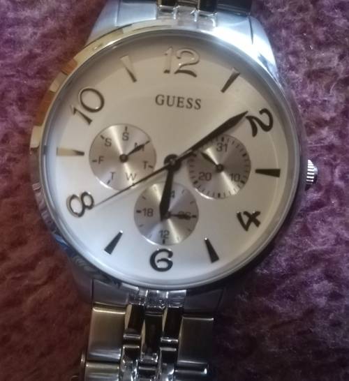 Guess Ladies Watch Stainless Steel Thin Mint.