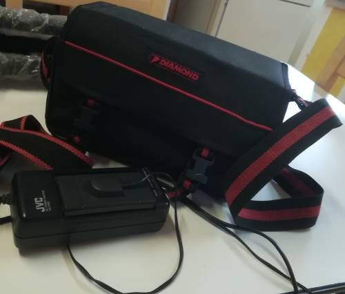 JVC VIDEO CAMERA MODEL GR - AX860. COMES WITH TRIPOD AND CARRY CASE & REMOTE CONTROL.