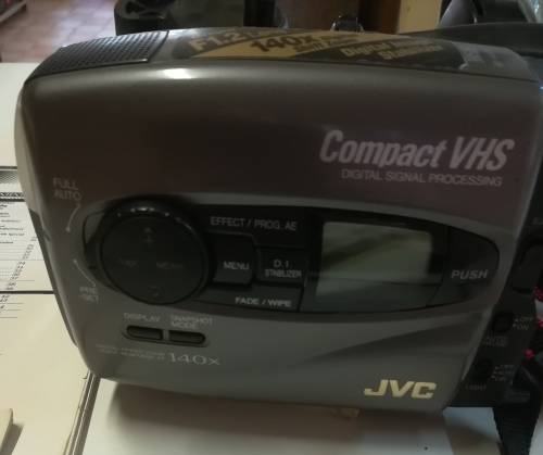 JVC VIDEO CAMERA MODEL GR - AX860. COMES WITH TRIPOD AND CARRY CASE & REMOTE CONTROL.