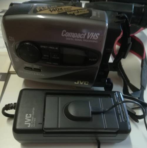 JVC VIDEO CAMERA MODEL GR - AX860. COMES WITH TRIPOD AND CARRY CASE & REMOTE CONTROL.