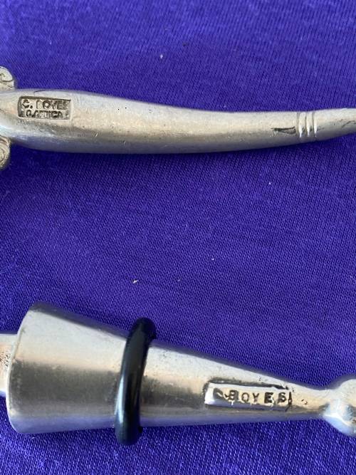 CARROL BOYES STAMPED WINE BOTTLE STOPPER AND SUGAR SPOON