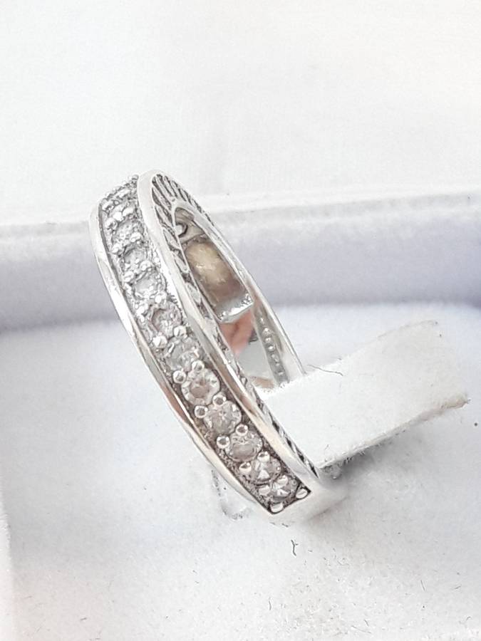 Sterling silver half eternity ring with clear zirconias