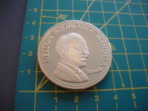 Gold Plated Mandela "Ten Years of Freedom" commemorative token.