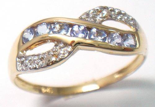 Beautiful solid 10kt gold and genuine tanzanite and diamond ring.