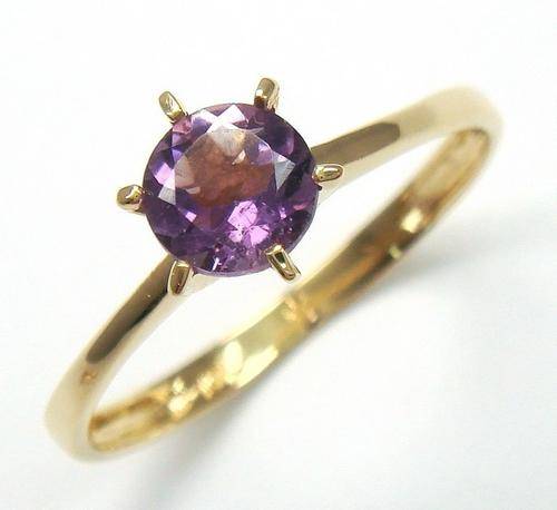 Beautiful solid 10kt gold and genuine amethyst ring.