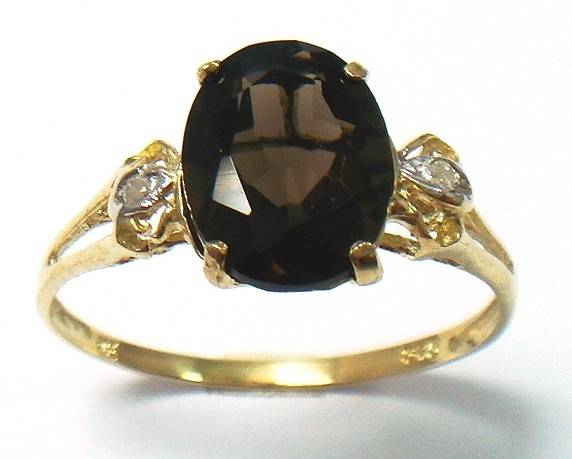 Beautiful solid 10kt gold and genuine smokey topaz and diamond ring.