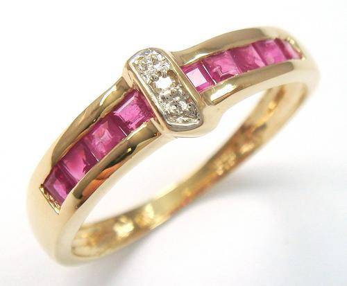 Beautiful solid 9kt gold and genuine ruby and diamond ring.